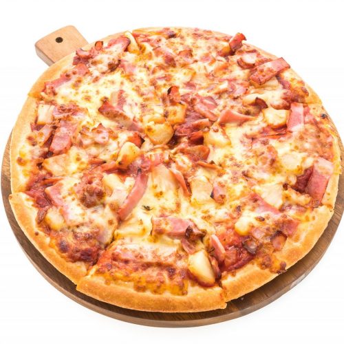 Hawaiian pizza on wooden plate isolated on white background